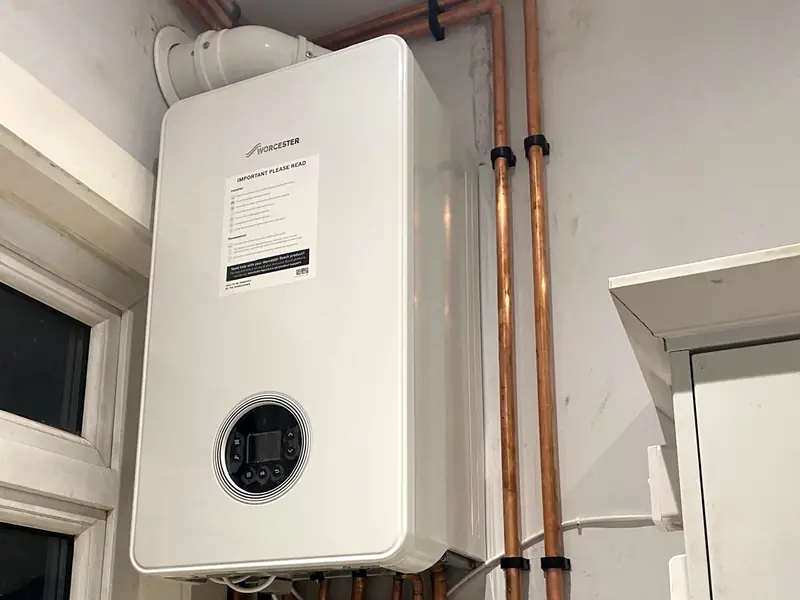 White Worcester combi boiler with neat copper pipework